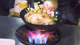 'Chinese Street Food -Night Market Egg Fried Rice Fried Noodles, Steam Fish in Stone Pot'