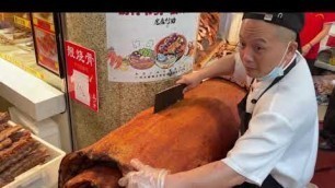 'Chinese Street Food BBQ Pork Chopped Roasted Pig in Guangzhou, China'