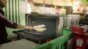 'Delicious Egyptian Street Food Pizza'