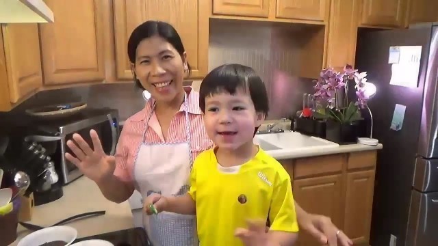 'Champorado chocolate rice | John helps mommy cook Filipino food and helps to taste test it, too.'