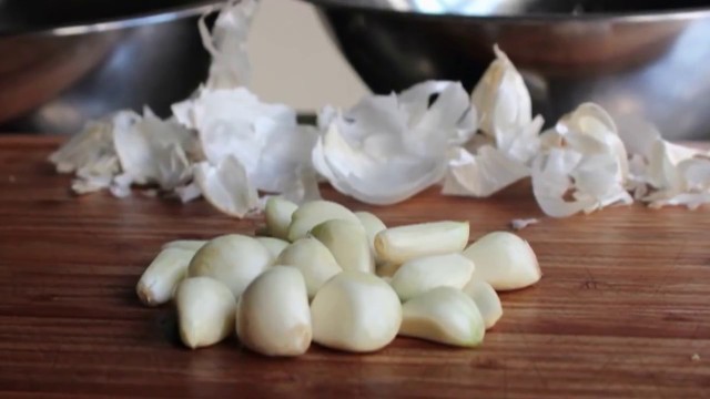 'LikedVideos: Brought to you by Foodwishes.com VERY cool!  Peeling Garlic!'