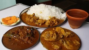 'chicken gravy eating with basmati rice good food to eat'