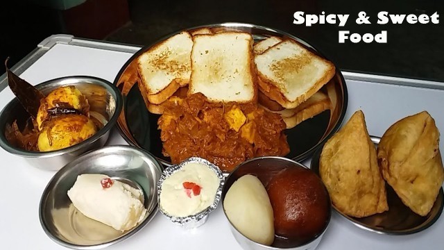 'spicy food and sweet food eating (Indian Food)'