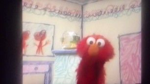 'Elmo’s world food water and exercise but piano is on the screen'