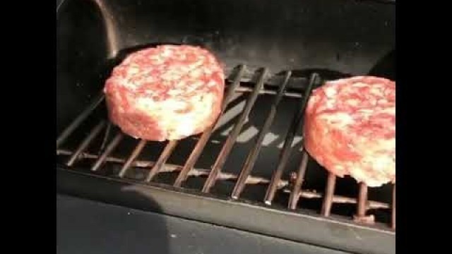 'Grilling Burger Patties on Mini Smoker 