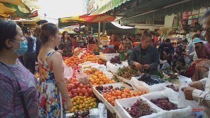 'People Buying Fruits A Day Before Meak BoChea-Fresh Food And People Activities In Phnom Penh Market'
