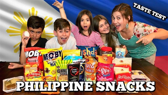 'PHILIPPINES FOOD TASTE TEST | AMERICAN KIDS TRY FILIPINO CANDY | KIDS TRY BALUT | PHILLIPS FamBam'