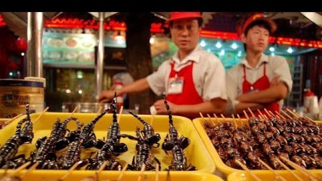 'Source of corona virus in wuhan china( Exotic food market in wuhan china)Eating live Rats'