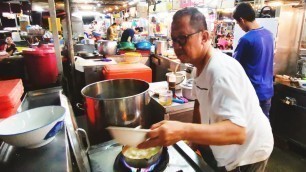 'Street Food Malaysia Penang Pork Soup and Yam Rice'