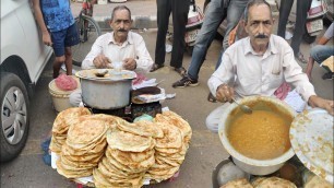 '70 years Old Uncle selling Lucchi Poori Chane | Amritsar | Street food india'