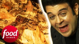 'Adam Roasts A Pig Whole Then Tears It Apart With His Hands | Man V Food: The Carnivore Chronicles'