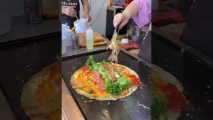 'China Street Food! Chinese food is similar to pizza'
