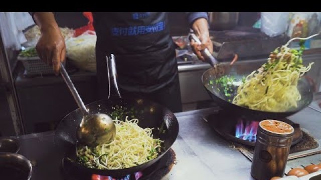 'Chinese Street Food-The best egg fried rice fried noodles，One chef fry two pots at the same time'