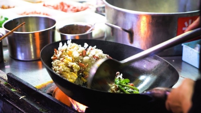 'Chinese Street Food -Night market egg fried rice fried noodles, breakfast fried dough sticks'