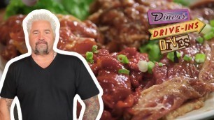 'Guy Fieri Eats All-You-Can-Eat Korean BBQ | Diners, Drive-Ins and Dives | Food Network'