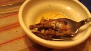 'Bizzare Filipino Food - eating dried fish heads'